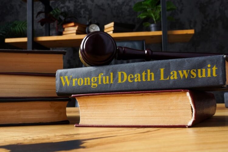 Stack of books and Lawsuit for Wrongful Death.