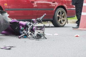 There was a motorbike accident on the city street. 
